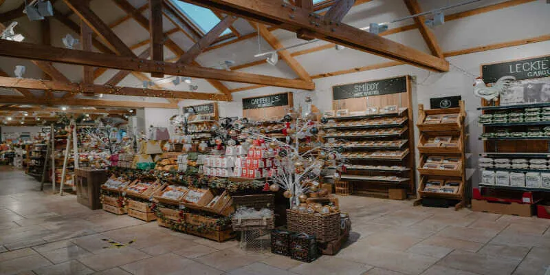Shelves packed with organic jams and handmade gifts.