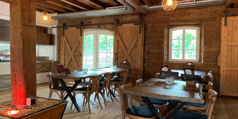 The cozy bar area offers a warm fireside welcome